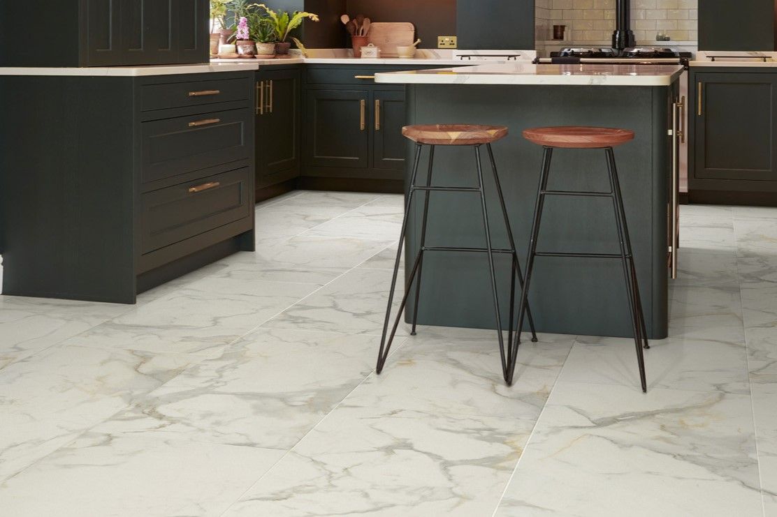 Modern dark green kitchen with Karndean Calacatta white marble effect luxury vinyl flooring
